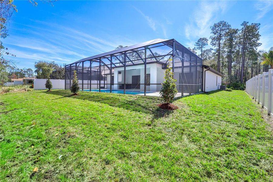 Front exterior of a new home in , Palm Coast, FL, highlighting curb appeal (Image 24). Front exterior of a new home in , Palm Coast, FL, highlighting curb appeal (Image 24).