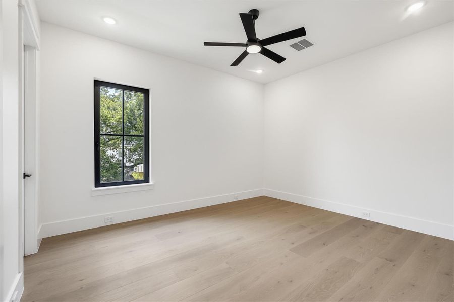 Each secondary bedroom is spacious and features a walk in closet and custom European windows