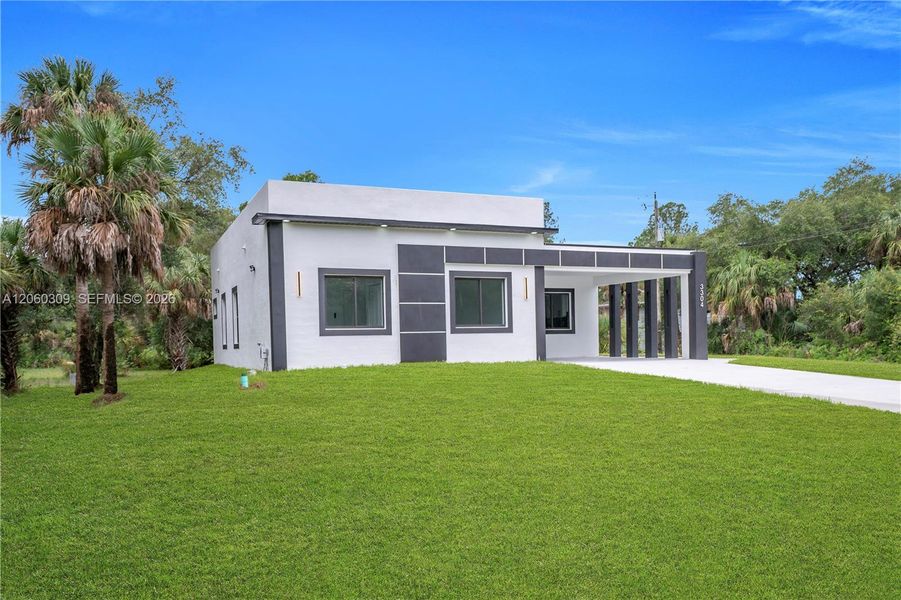 Exterior details and patio area of a home in , Lehigh Acres (Image 29).