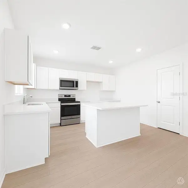 Furnished interior view inside a new home in , Parrish (Image 5).