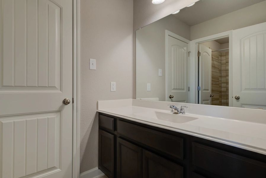 Representative furnished interior of a home built from the Cleburne by Ashton Woods in Mustang Oaks, San Antonio (Image 40).