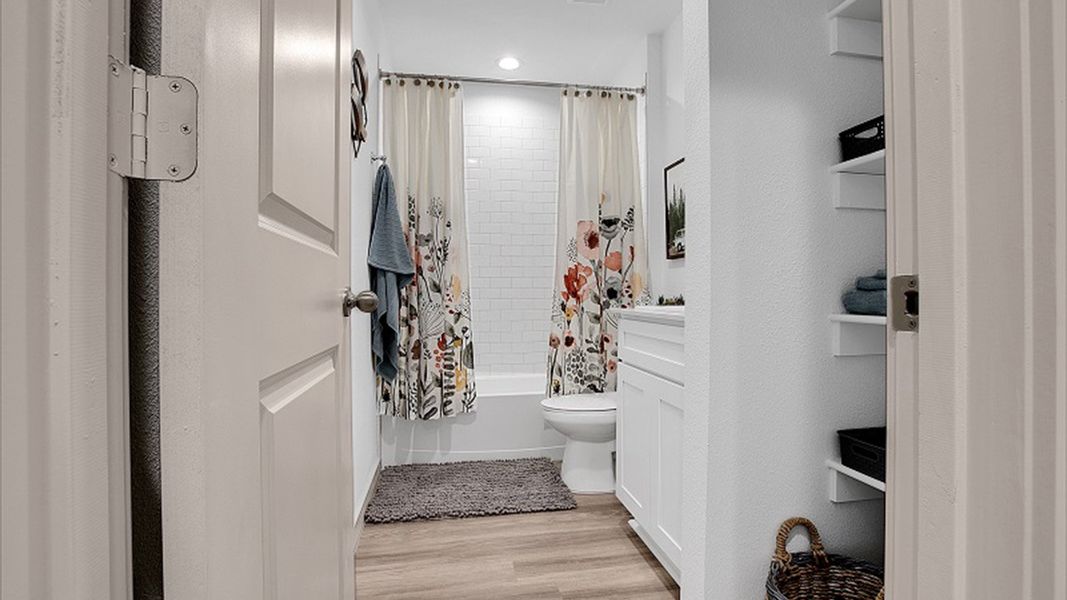 Representative furnished interior of a home built from the The Texas Cali by D.R. Horton in Abbey Glen, Lubbock (Image 14).