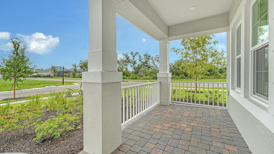Exterior details and patio area of a home in Wildleaf Real Estate and Homes for Sale in Parrish, FL - Neal Communities, Parrish (Image 3).