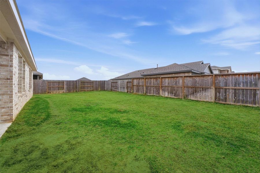Exterior details and patio area of a home in River Ranch Meadows, Dayton (Image 24). Exterior details and patio area of a home in River Ranch Meadows, Dayton (Image 24).