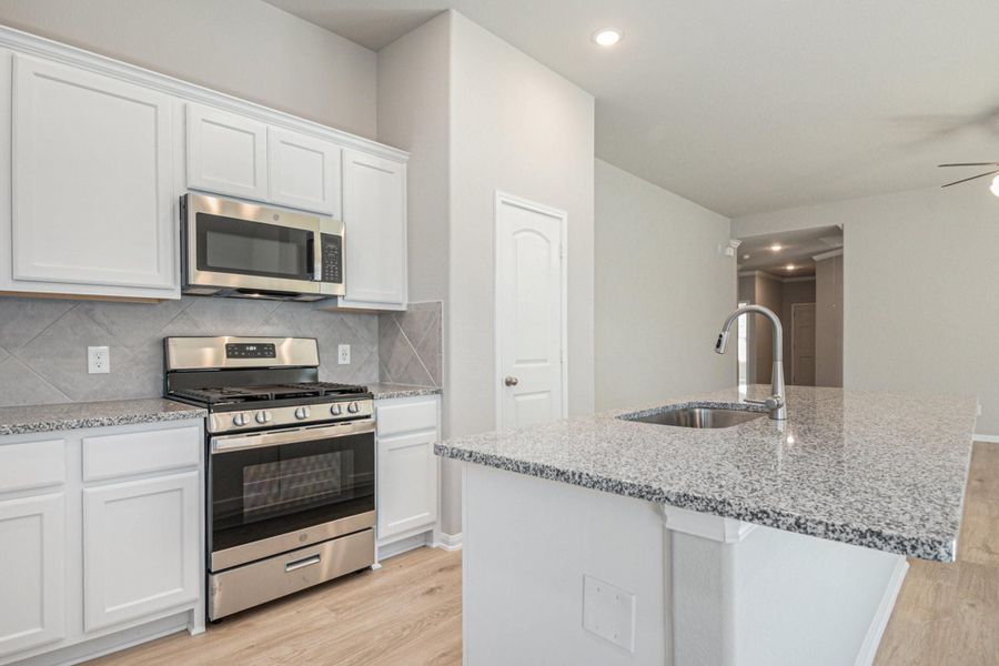 Furnished interior view inside a new home in Clear View Estates, Willis (Image 10).
