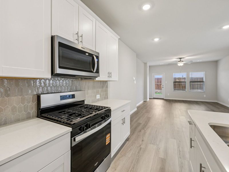 Furnished interior view inside a new home in Parks at Foster Crossing - Spring Series, Anna (Image 8).