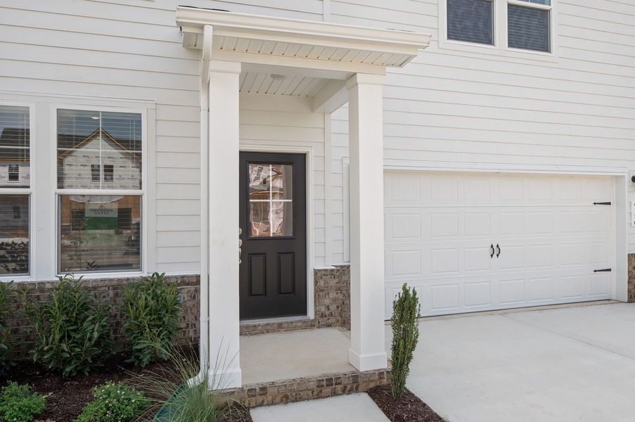 Front exterior of a new home in Calista Farms, White House, TN, highlighting curb appeal (Image 20).