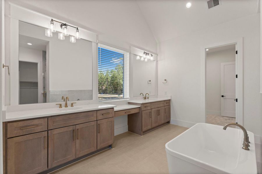 Furnished interior view inside a new home in Homestead Hill, New Waverly (Image 7).