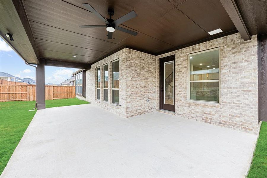 Exterior details and patio area of a home in Windsong Ranch Classic 61, Prosper (Image 3).