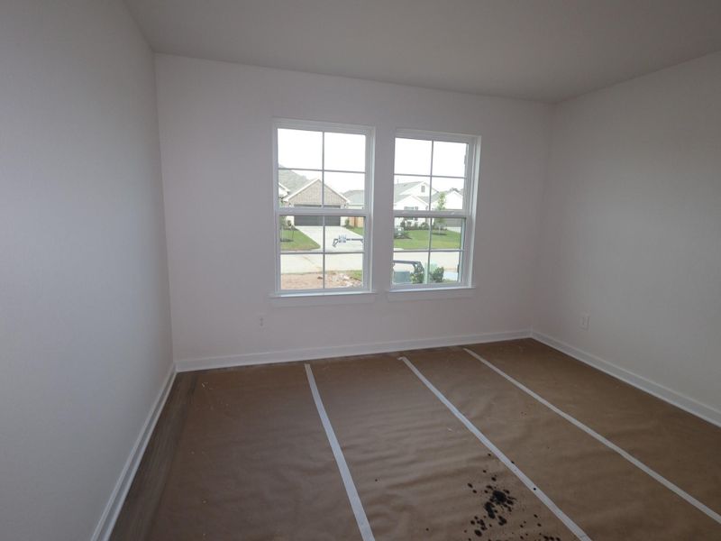 In-progress construction of a new home in Pinewood at Grand Texas, New Caney, TX (Image 31).