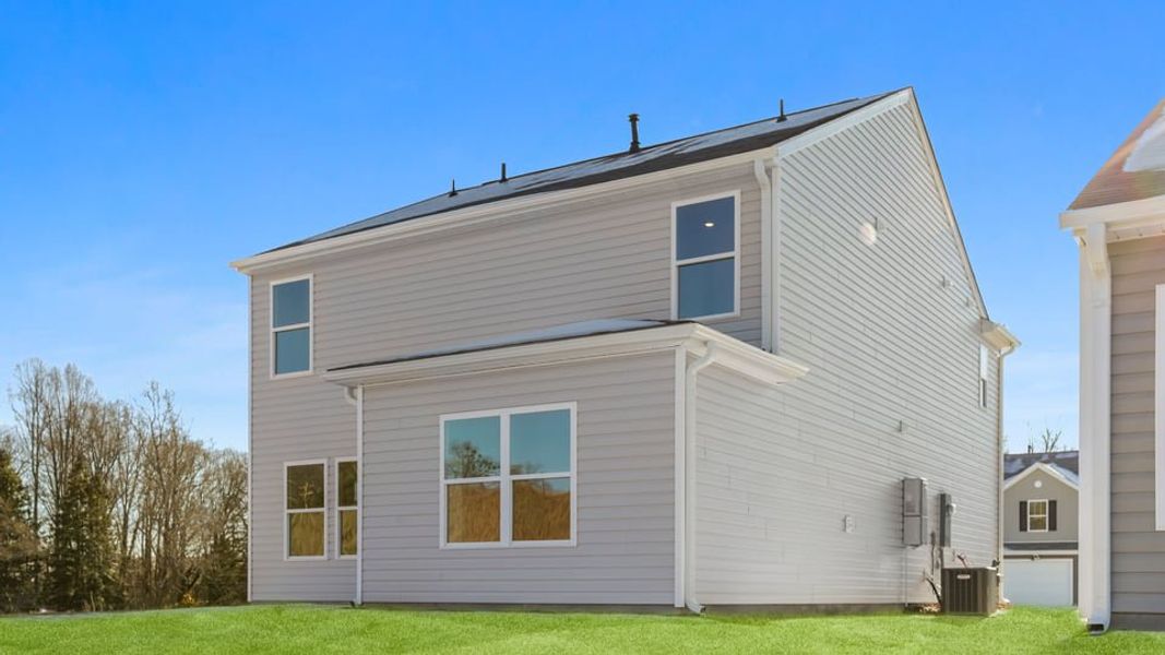 Exterior details and patio area of a home in Village Grove, Greenville (Image 20).