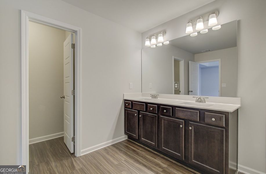 Furnished interior view inside a new home in Crofton Place Enclave, Snellville (Image 5). Furnished interior view inside a new home in Crofton Place Enclave, Snellville (Image 5).