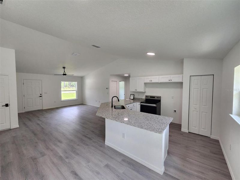 Furnished interior view inside a new home in , Dunnellon (Image 3).