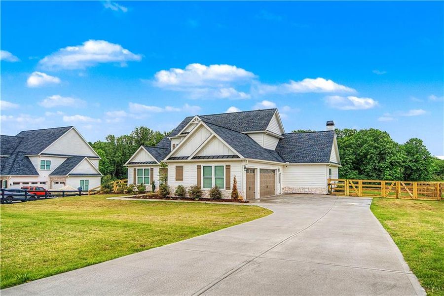 Front exterior of a new home in , Cumming, GA, highlighting curb appeal (Image 20).