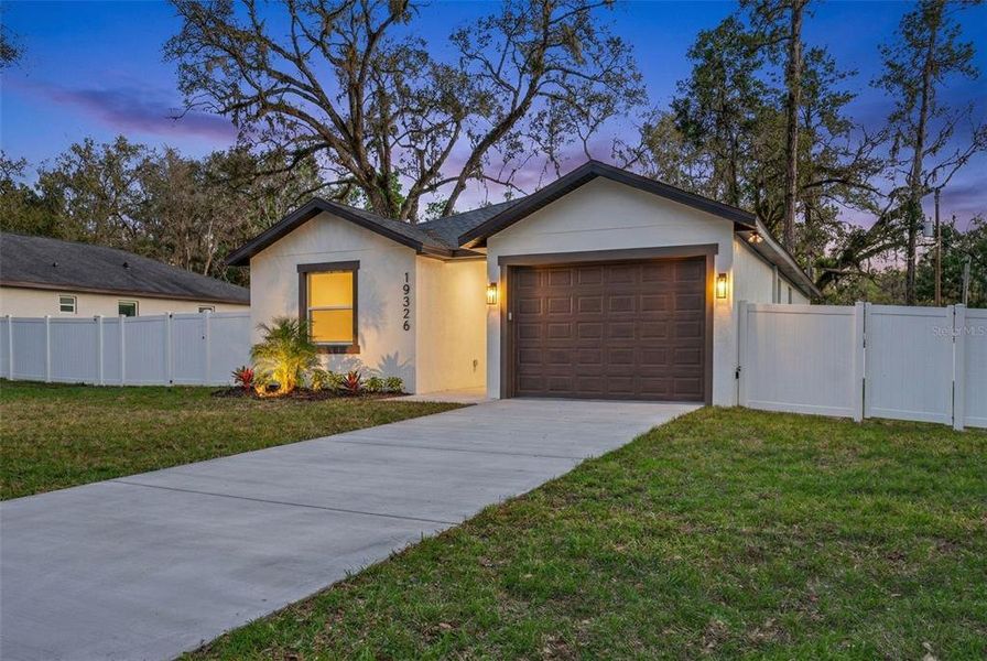 Front exterior of a new home in , Brooksville, FL, highlighting curb appeal (Image 30).