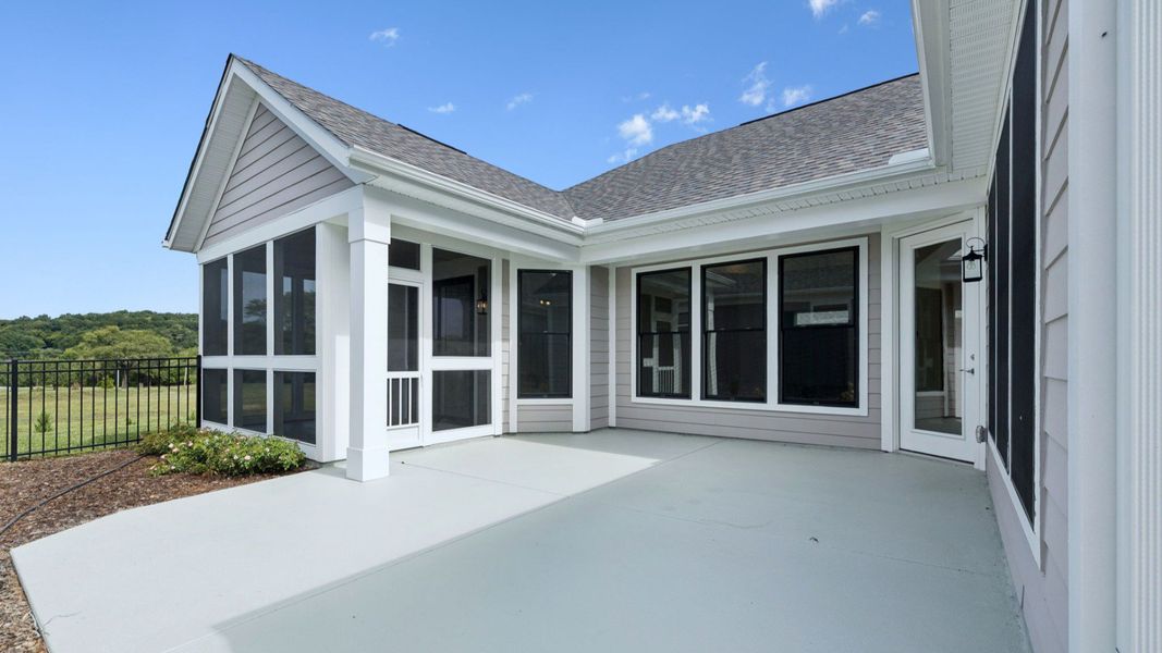 Exterior details and patio area of a home in The Courtyards at Stewarts Creek, Smyrna (Image 3).