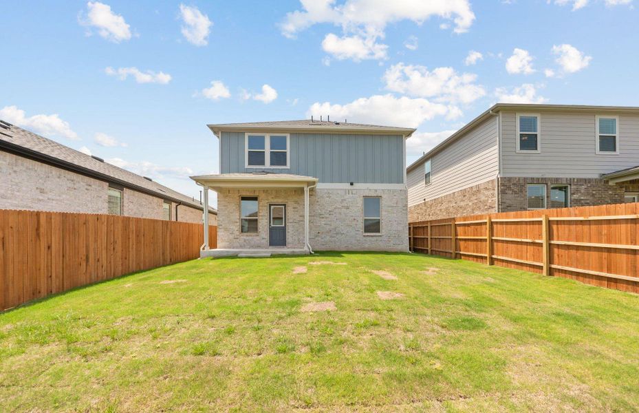 Exterior details and patio area of a home in Saddleback at Santa Rita Ranch, Liberty Hill (Image 3).