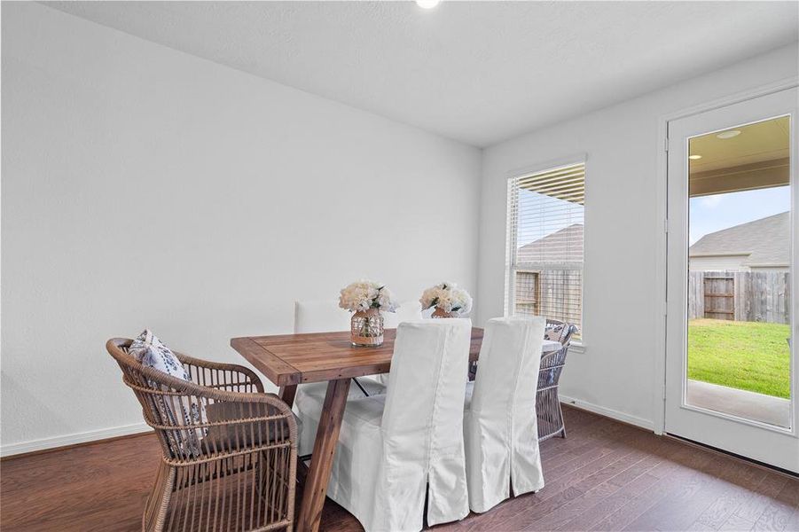 Make memories gathered around the table with your family and friends! This dining room features high ceilings, large windows, and easy access to your kitchen and living room.