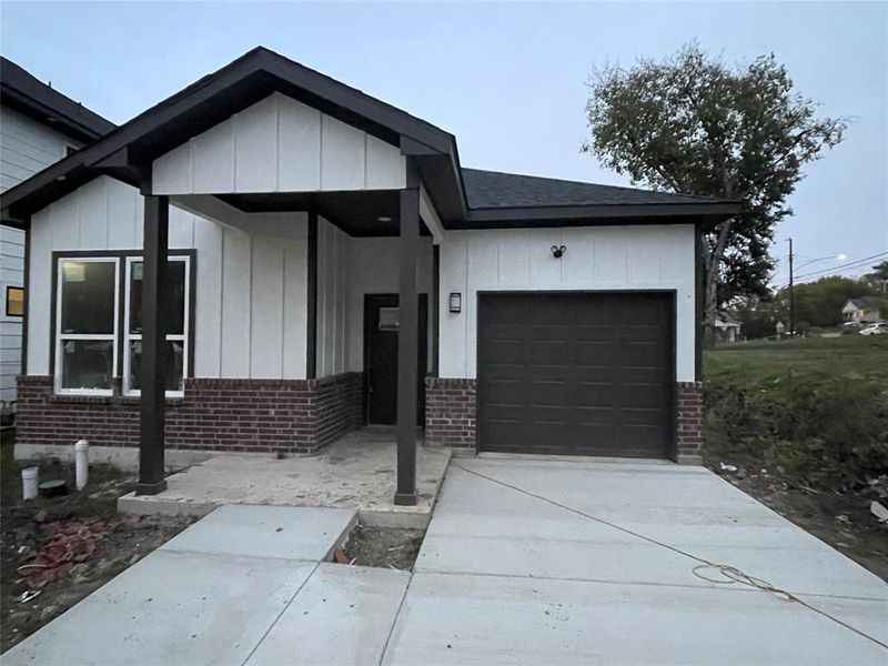 View of front of home with a garage