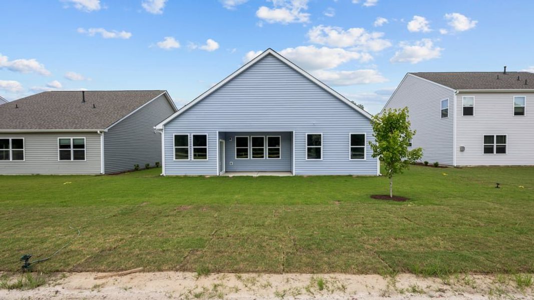 Exterior details and patio area of a home in West New Bern, New Bern (Image 22).