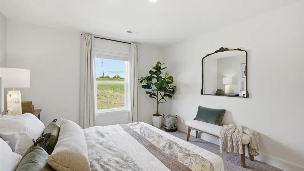 Representative furnished interior of a home built from the Mitchell Townhome by D.R. Horton in Smoky Hollow, Sevierville (Image 19).