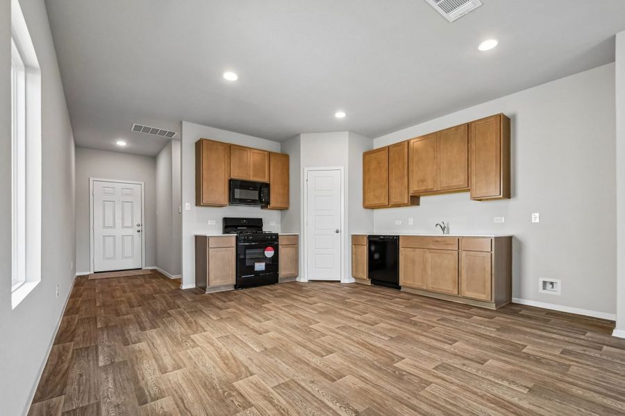 Furnished interior view inside a new home in Hymeadow, San Marcos (Image 7).