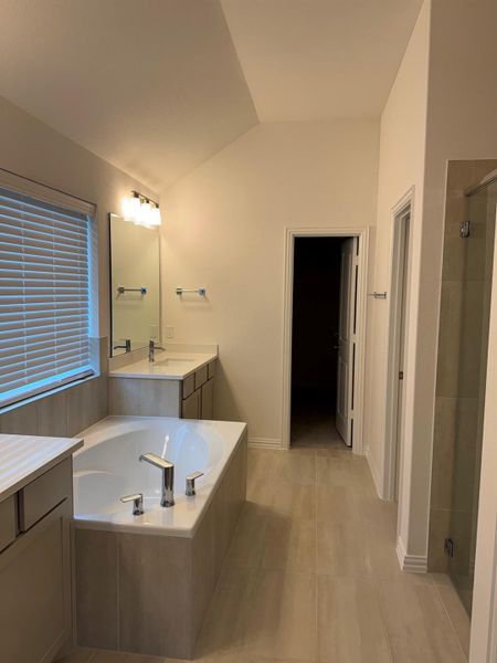 Relaxing primary retreat designed for comfort with direct access to the spa inspired bath. Relaxing primary retreat designed for comfort with direct access to the spa inspired bath.