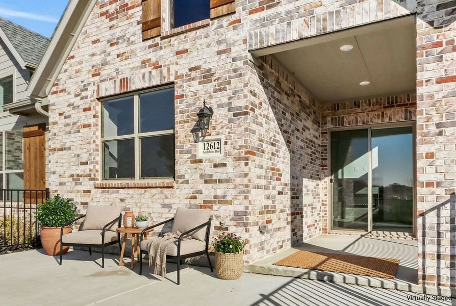 Exterior details and patio area of a home in Cottonwood Creek, Rowlett (Image 4).