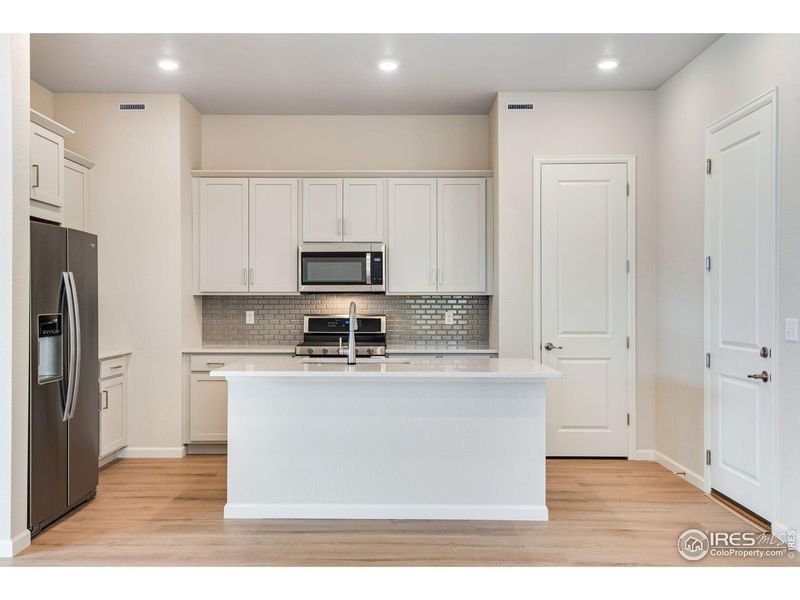Furnished interior view inside a new home in Westside Crossing, Berthoud (Image 10).
