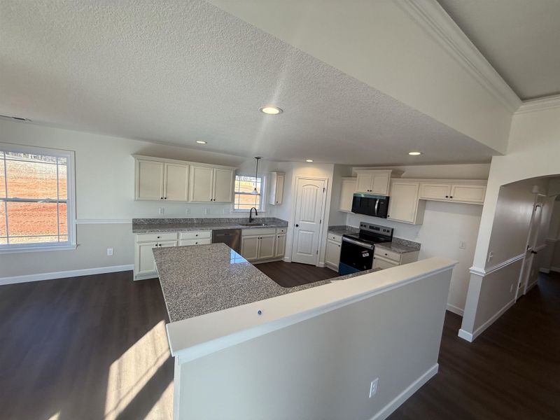Furnished interior view inside a new home in Mills Gin, Campobello (Image 6).