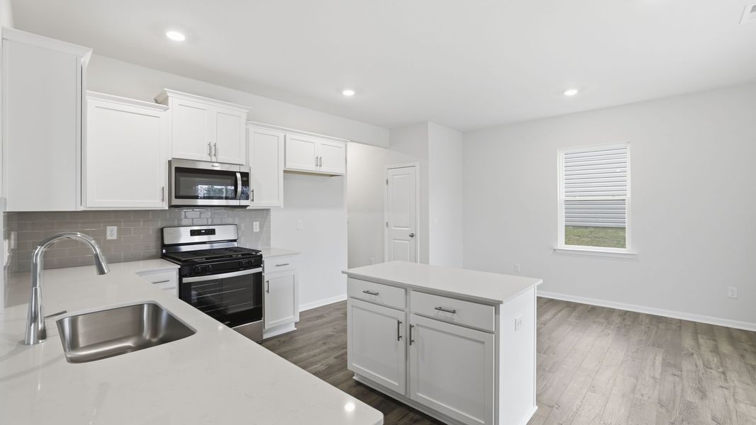 Furnished interior view inside a new home in Durbin Meadows Traditions, Fountain Inn (Image 9).