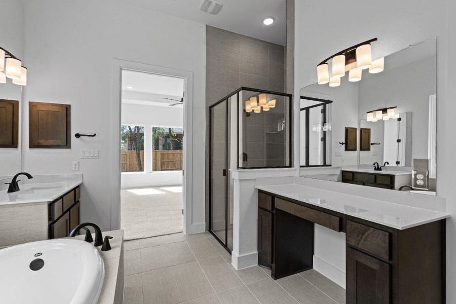 Primary Bath retreat with dual vanities & garden tub