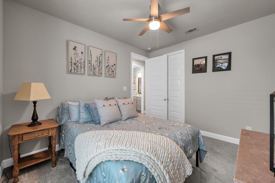 Furnished interior view inside a new home in Grand Central Park 45', Conroe (Image 29).