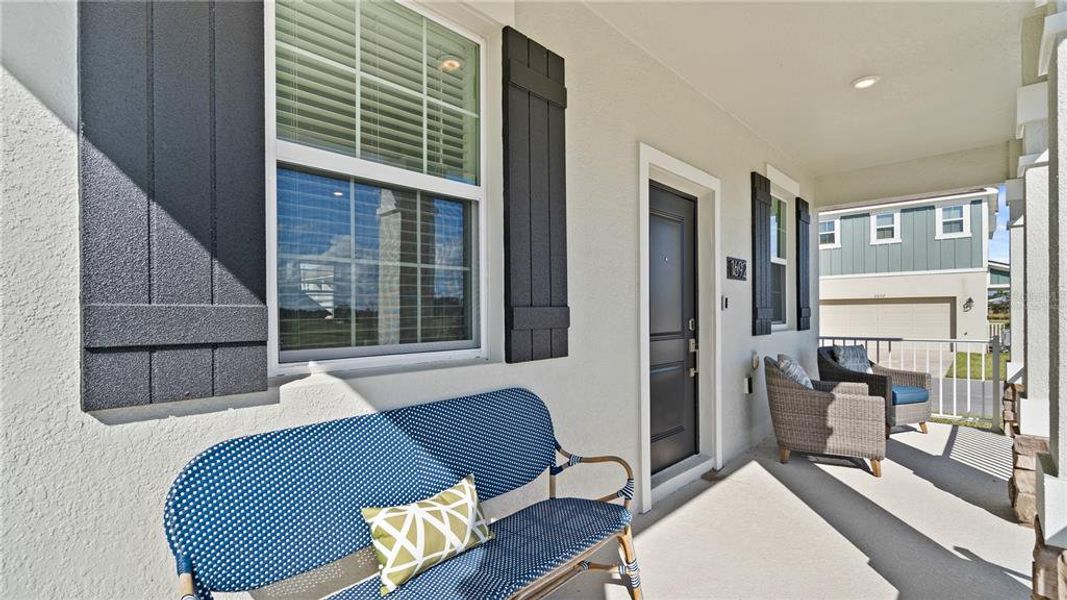 Exterior details and patio area of a home in Bridgewalk, St. Cloud (Image 2).