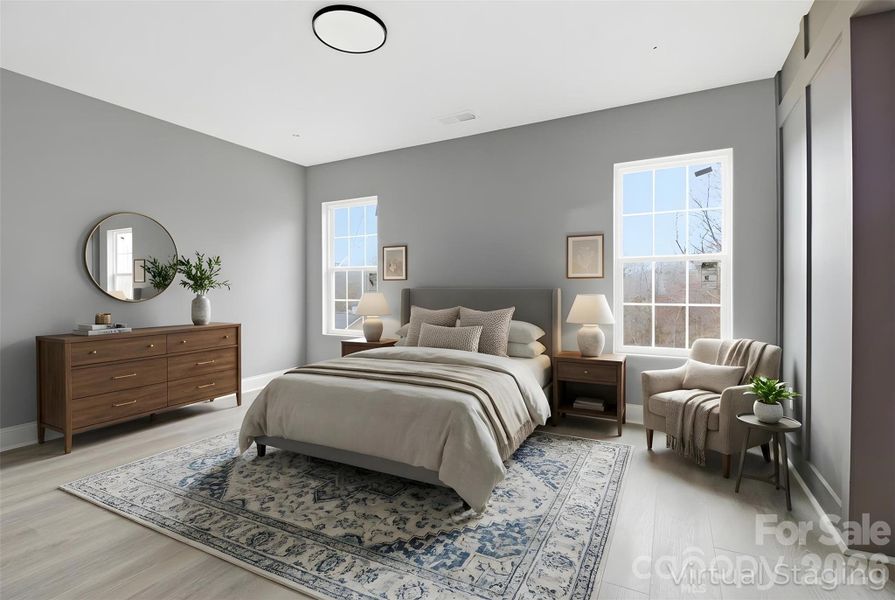 Walking into primary bedroom on the second floor (virtually staged/enhanced).