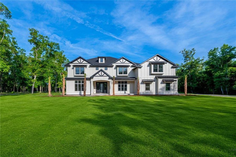 Front exterior of a new home in , High Springs, FL, highlighting curb appeal (Image 5).
