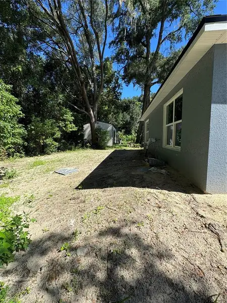 Exterior details and patio area of a home in , Ocala (Image 7). Exterior details and patio area of a home in , Ocala (Image 7).