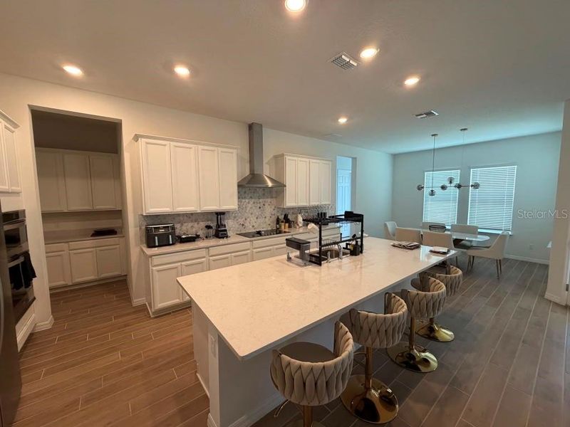 Furnished interior view inside a new home in , Winter Garden (Image 34).