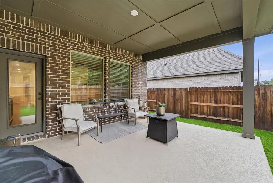Exterior details and patio area of a home in , Magnolia (Image 3).