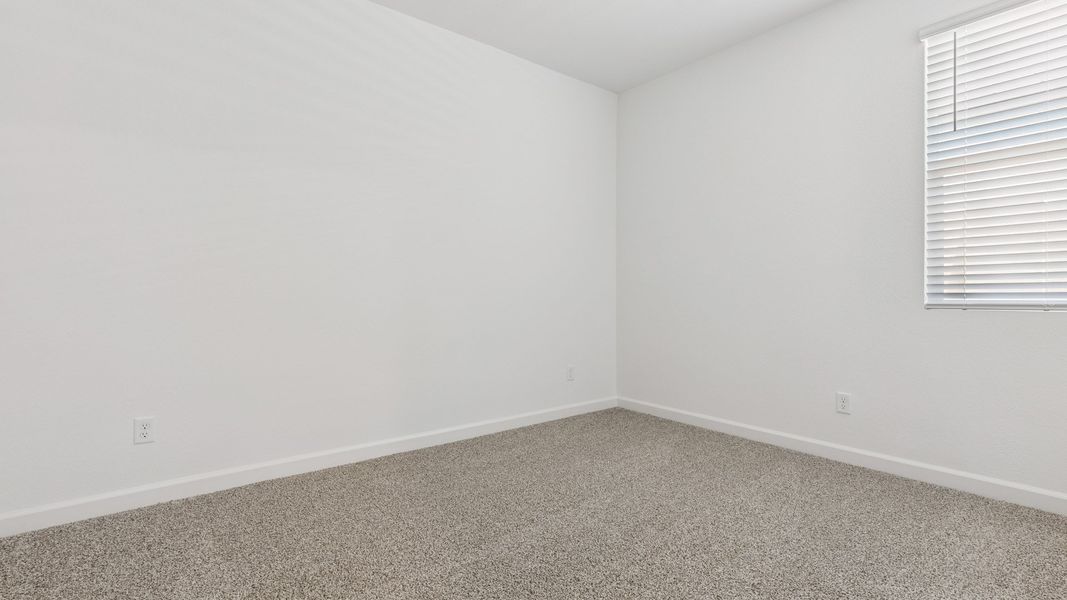 Spacious, unfurnished interior of a new home in Zanjero Pass, Waddell (Image 29).