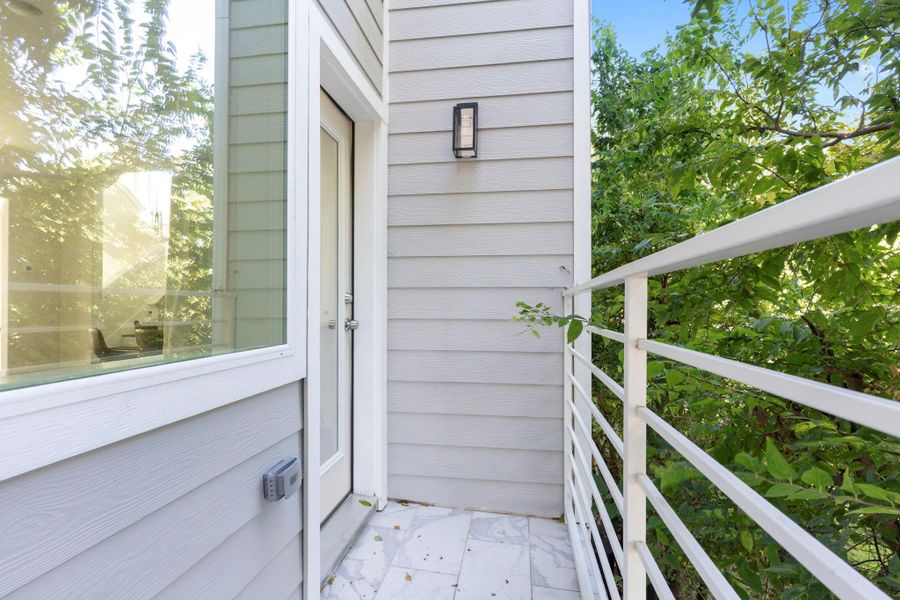Private balcony offering a relaxing spot to enjoy the view.