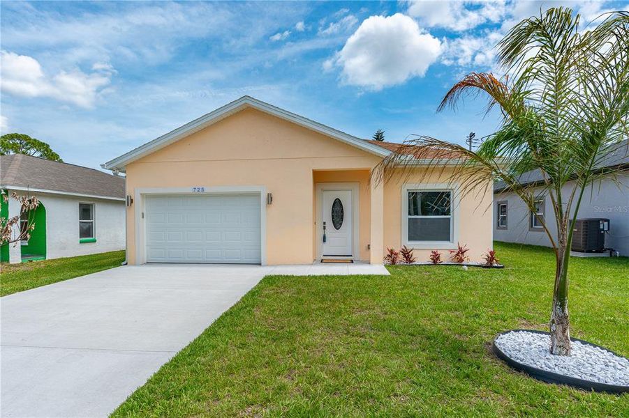 Front exterior of a new home in , Daytona Beach, FL, highlighting curb appeal (Image 20).