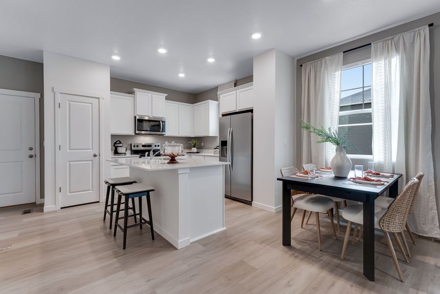 Representative furnished interior of a home built from the AUGUSTA by D.R. Horton in Vista Meadows, Fort Lupton (Image 8).