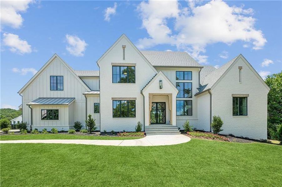 Front exterior of a new home in , Canton, GA, highlighting curb appeal (Image 2).