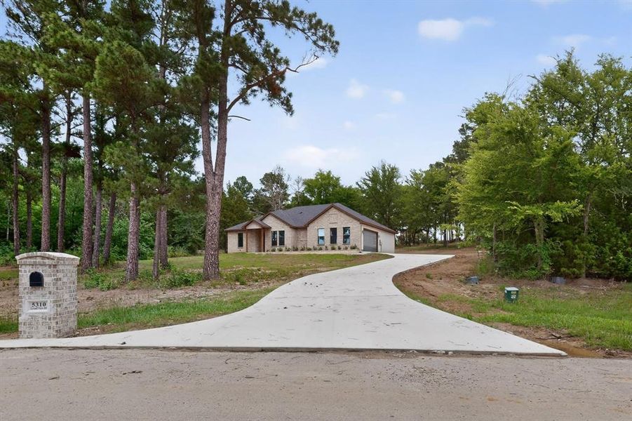 Front exterior of a new home in , Athens, TX, highlighting curb appeal (Image 1). Front exterior of a new home in , Athens, TX, highlighting curb appeal (Image 1).