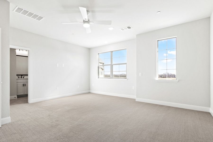 Spacious, unfurnished interior of a new home in The Tribute, The Colony (Image 37).