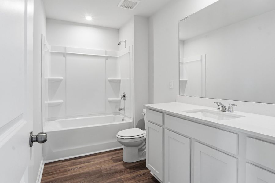 Furnished interior view inside a new home in Sanctuary Cove at Cane Bay, Summerville (Image 8).