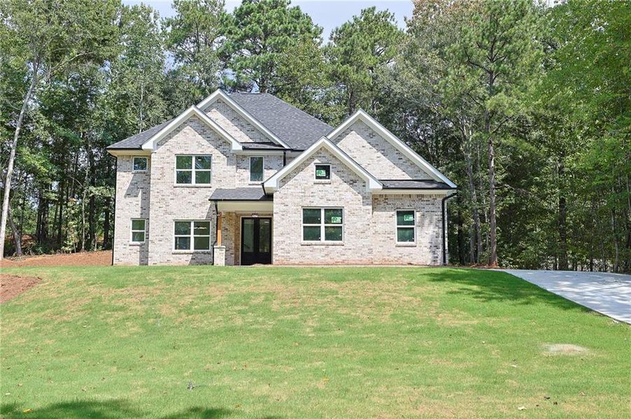 Front exterior of a new home in , McDonough, GA, highlighting curb appeal (Image 19).