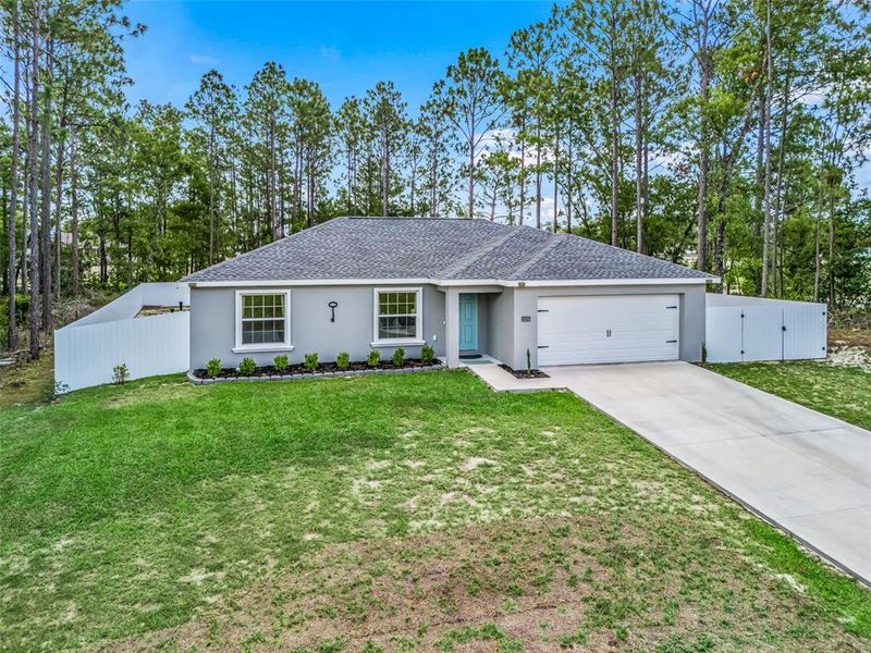Front exterior of a new home in , Ocala, FL, highlighting curb appeal (Image 22).