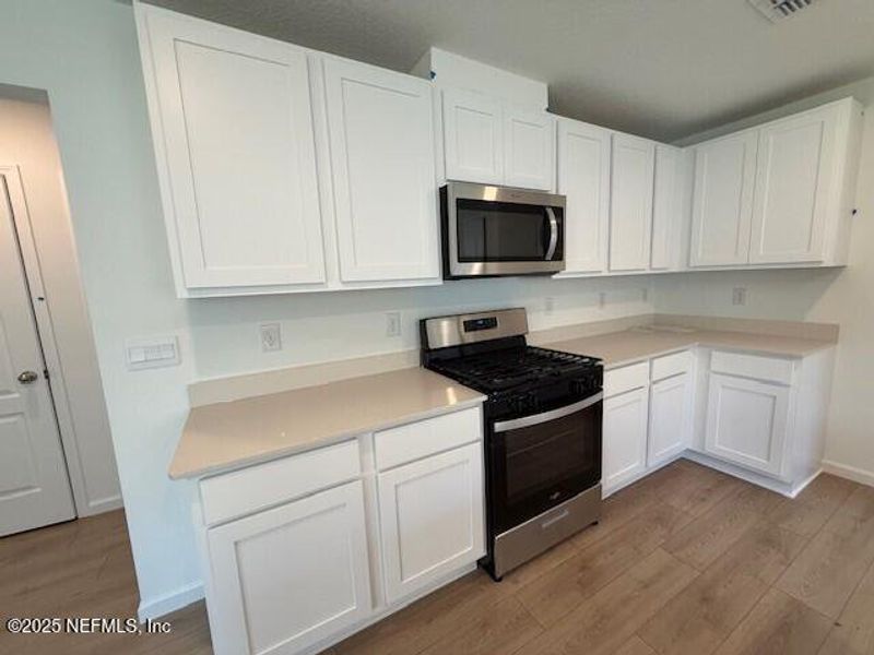 Furnished interior view inside a new home in Grand Reserve, Bunnell (Image 7).